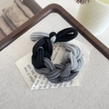 Thick elastic braided hair tie in black and grey tones with decorative knot style - Brown