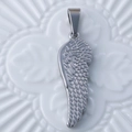 Silver vintage stainless steel wing pendant with detailed feather texture and bail - Wing / Steel