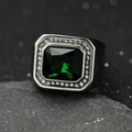 Macro detail of men's titanium steel ring with emerald-cut stone and diamond accents - US 7 / Green Gemstone / Silver