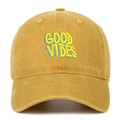 Close-up of vibrant multi-color GOOD VIBES 3D embroidery on mustard yellow washed cotton cap - Yellow