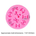 Roze ronde siliconen vorm met diverse strikvormen voor fondant en handwerk - Roze