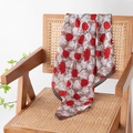 Vintage silk scarf with brown tulip floral pattern draped on a rattan wooden chair - Brown Rose