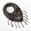Detail of the tactical scarf showing black and tan plaid pattern with fringe edges - Khaki