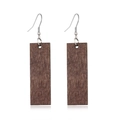 Close-up of rectangular dark wood hollow earrings with silver hooks on white background - Style 28