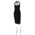 Detailed close-up of a black ruched bodycon dress with halter neckline and elastic fabric - S / Ruched Halter Style / Black