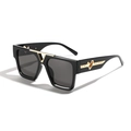 Oversized square black sunglasses with golden V-shaped bridge and heart-accented temples - Bright Black / Gray