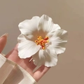 Realistic white hibiscus hair clip with detailed yellow stamen for seaside styling - White Hibiscus Hair Clip