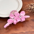 Pink acetate flower hair claw clip with rhinestones shown in a lifestyle setting - Korean Pink-13cm