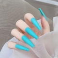 Macro detail of extra long matte Tiffany blue coffin press-on nails on a model hand - Tiffany Blue-Glossy(CBL-29)