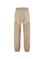 Detail of beige drawstring joggers showing patchwork design and vertical pleated texture - Khaki