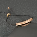 Adjustable black woven rope bracelet with polished rose gold metal bar and sliding clasp - Black Rope Rose Gold