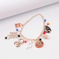 Detail of Halloween charm bracelet with enamel pumpkin ghost and spider charms - Halloween Bracelet