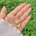Polished 18K gold plated S-shaped bubble letter necklace with a sleek snake chain style - Gold S