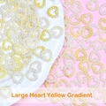 Macro shot of yellow gradient heart-shaped ABS pearls for DIY hair accessory making - Large Heart Pendant / Gradient Yellow White