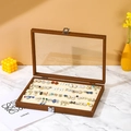 Walnut wood jewelry box with glass lid for earring storage on marble surface - 4 Section Earring Holder / Walnut With Beige Interior