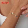 Minimalist gold cross bracelet for women with bezel-set round blue gemstone - Royal Blue (B0314)