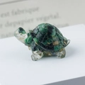 Cute crystal turtle figurine with green resin shell and gold foil flakes on white surface - 54 Ruby Zoisite + Gold Foil