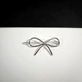 Minimalist silver metal bow hair clip with geometric alloy design for women - Silver Bowknot