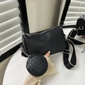 Black woven shoulder bag with round coin purse and wide patterned strap in faux leather - Black