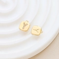 Detailed macro view of gold-plated square letter Y charms with cubic zirconia inlay - Letter Y