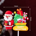 Christmas cake topper featuring Santa with sleigh and Merry Christmas text 5.8cm x 5.2cm - Soft Rubber Santa with Yellow Gift Bag
