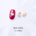 Macro view of pink teardrop nail crystals with gold metal trim and 6.5x9mm sizing - Gold Base Pink Water Drop (8201粉)