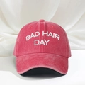 Adjustable washed red cotton baseball cap with Bad Hair Day white embroidery text - Watermelon red