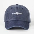 Detailed close-up of white shark embroidery on navy washed denim cotton baseball cap - One Size / Navy Blue