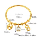 Detail of 18k gold plated stainless steel bracelet with zircon charms and infinity symbol - Zircon Pendant Bracelet Set / Gold