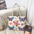 Floral canvas tote bag with butterfly and pink flower prints on a beige base - Style 5