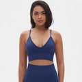 Detail of dark blue seamless sports bra and high-waisted ribbed leggings set - S / Dark Blue