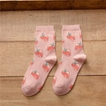 Pink cotton blend crew socks featuring a sweet red strawberry pattern on wooden background - Girly Full Strawberry (Pink All-over Print)