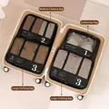 Black travel organizer set with mesh windows and numbered labels in beige suitcase - Black 4-Piece Set