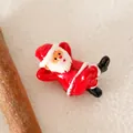 Miniature resin Santa Claus figurine in a relaxed lying pose for Christmas decor - 3x4.5x2.5cm