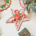 Star-shaped clay gingerbread ornament with sugar texture and candy cane detail - Star Width 10.5cm