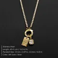 14K gold plated stainless steel necklace with rhinestone initial R pendant variant. - Letter R (XNL0116)