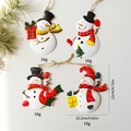 Set of four metal snowman Christmas ornaments with red and white festive holiday patterns - Set 2 (Snowman 4-Piece Set)