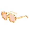 Chic oversized hexagonal sunglasses in transparent orange with geometric resin frames - Transparent Tea Frame Champagne Lens