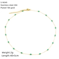 Dettaglio della collana in acciaio inossidabile placcato oro 18K con perle turchesi - Stile Catena Oro Perline Verdi (S-N549)