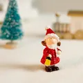 Miniature Christmas girl figurine in red coat holding a yellow lantern for holiday decor - Christmas Little Girl / 3x2.5x5.5cm