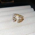 Close-up of vintage multi-layer pearl ring with zircon accents in a velvet jewelry box - Style 1 Gold-Pear Shaped Zircon Pearl