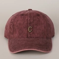 Detail of vintage washed cotton baseball cap with antique bronze metal C initial - Red