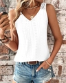 Detail of white V-neck tank top with hollow embroidery and delicate lace trim accents - S / White