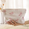 Corduroy makeup bag in cream white featuring soft pink watercolor bow prints - Beige Pink Bow Print (FN373909)