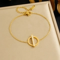 Elegant gold-plated stainless steel bracelet with geometric crystal pendant on jewelry box - Geometric Circle Style (B1896)