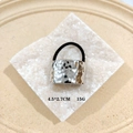 Silver hammered texture geometric hair clip with elastic band on a marble tray - 1066-2 Silver