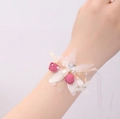 Pink floral wrist corsage with white feathers and golden wire for wedding ceremonies - Small Wrist Corsage-Rose Red