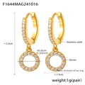 Macro detail of gold stainless steel hoop earrings featuring inlaid cubic zirconia accents - Gold Circular Ring Pendant