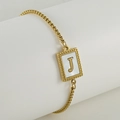 Gold stainless steel box chain bracelet featuring a shell inlay with a golden letter J - Letter J