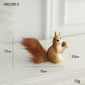 Brown foam squirrel ornament with fluffy tail and mini pinecone, 11cm tall decoration - Small Sitting Squirrel Ornament